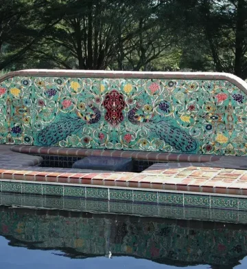 Pool-slider-3 waterline pool tiles with a tile mural in California