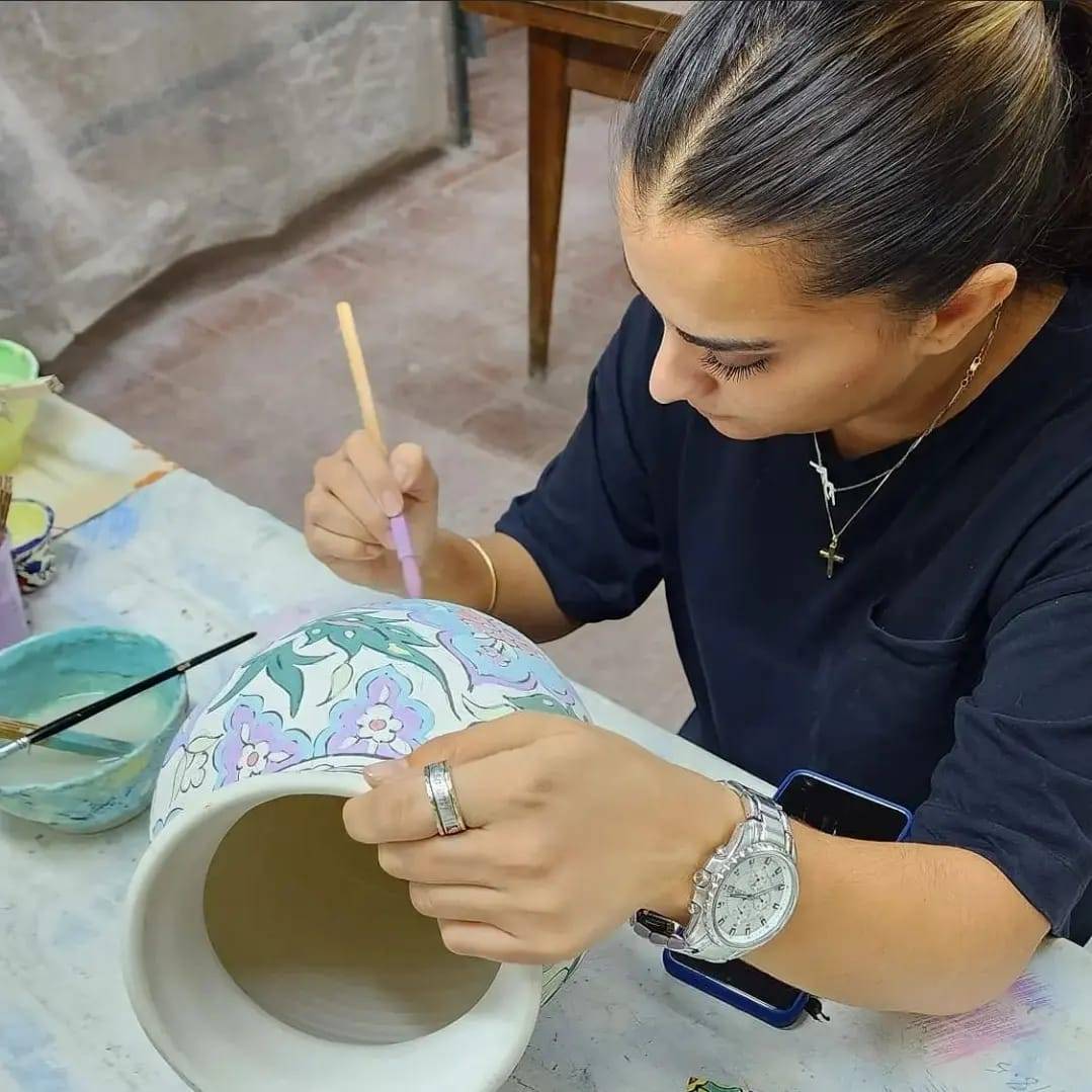 hand painted tiles and pottery