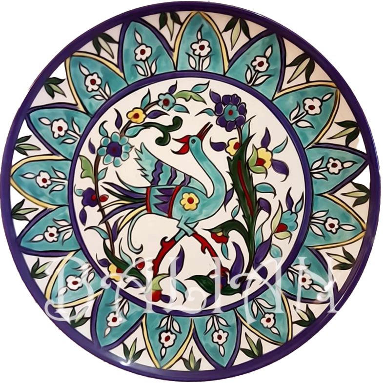 The hand painted 29cm decorative wall plate