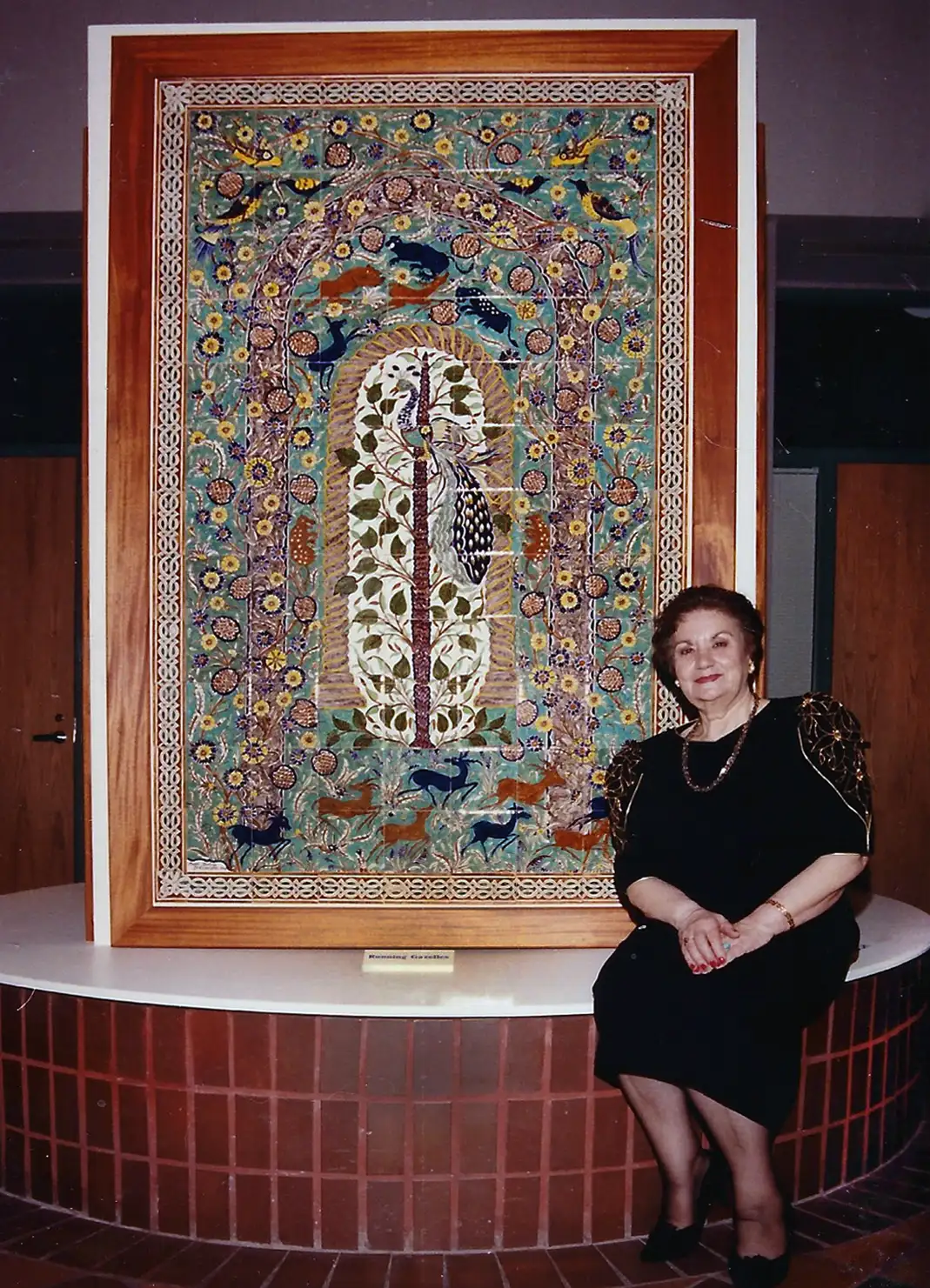 Mari Balian by her Tile mural at the Smithsonian
