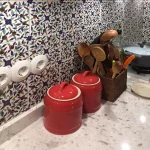 white-kitchen-with-blue-tiles