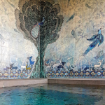 Custom artistic tile mural around a hot tub