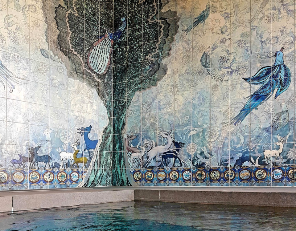 Custom artistic tile mural around a hot tub