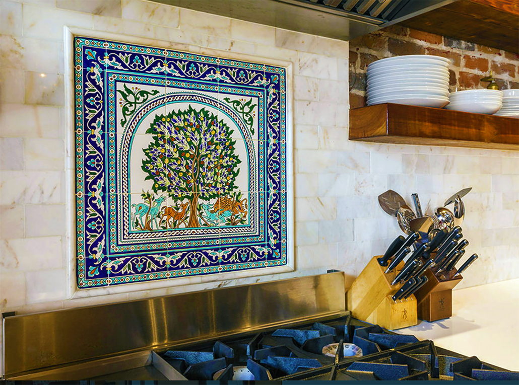 a beautiful Tree of life Tile mural by the Balian Studio as a kitchen backsplash tile art design